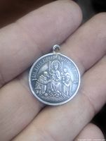 Obverse showing Three Kings relief and inscription