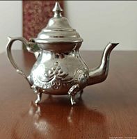 Full view right side of silver plated teapot