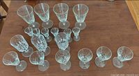 All 19 crystal glasses grouped on tabletop