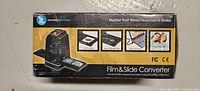 Front of product box showing Film & Slide Converter image and branding