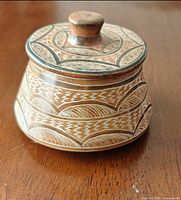 Stone bowl with lid shown closed