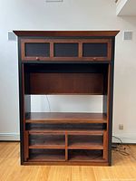 Front view showing entire entertainment center structure, shelves, doors, and dimensions perspective