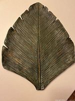 Front view of palm leaf wall decor