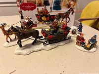 Front view of St. Nicholas Square Sleigh Ride figures