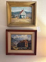 Both framed paintings on wall, showing subjects and frames
