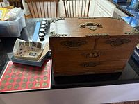 Chest, coin board, stamps overview