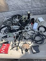 Overall view of microphones, headphones, power strip, cables