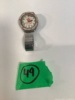 Watch front view showing dial, bezel, bracelet