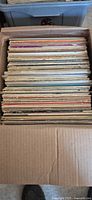 Box of vertically stacked 12" LP records