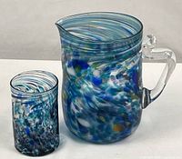 Pitcher and tumbler together front view showing size and matching pattern