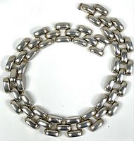 Full view of sterling silver choker arranged in circle