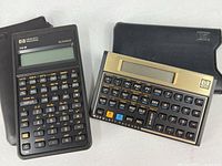 Both calculators with pouches visible