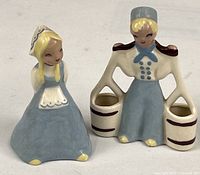 Both Yona Dutch boy and girl figurines front view