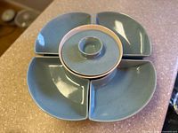 Top view of assembled blue ceramic divided serving set