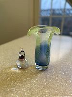 Murano vase and pear front view showing colors and shapes