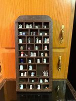 Full view of rack filled with thimbles