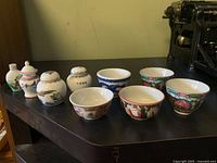 Group shot of all nine porcelain pieces