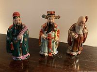 Front view of all three Fu Lu Shou porcelain figurines