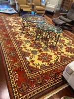 Full view of Afghan Kazak Uzbek Gazni area rug in room setting