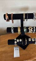 Overall view of bracelets on display stand with tag
