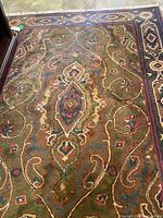 Full view showing central medallion and border