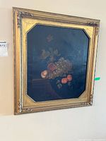 Full view of framed painting on wall