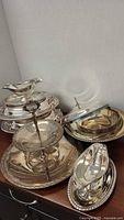 Group shot of all silver-plated serveware items