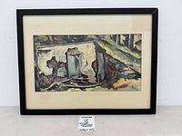 Front view of framed watercolor with signature visible