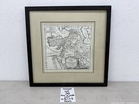 Front view of framed map under glass