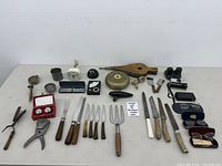 Overall view of assorted vintage items laid on table