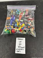Bagged assortment of toy cars front view