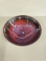 Top view showing multicolour crystalline glaze pattern inside bowl