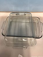 Top view of two clear glass rectangular Pyrex baking dishes stacked