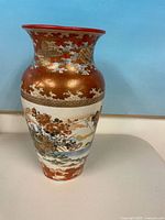 Full view of ceramic vase showing color, motif and condition