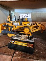 Toy CAT bulldozer and wired remote controller