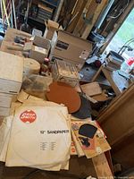 Overview of lot with sandpaper discs, disc plates, boxed accessories
