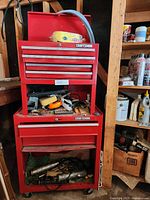 Full view of Craftsman rolling tool chest with drawers and contents visible