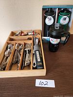 Overview showing organizer with flatware and boxed ThermoFlask bottles