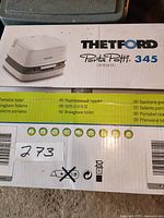 Front of box displaying Thetford Porta Potti 345 model and multilingual description
