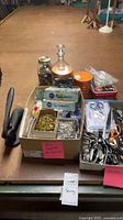 Overall view of lot including scissors, pins, tins and jars