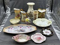Full group of floral ceramic items on display