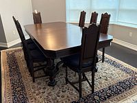Full view of table with leaves in dining room
