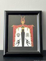 Front view of framed Erte print showing artwork and frame