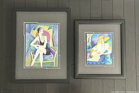 Both framed prints side by side showing overall appearance