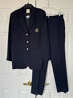 Full view of blazer and trousers