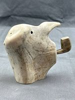 Side view showing one face profile and pipe projection