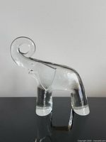 front view of clear glass elephant figurine showing overall form and clarity