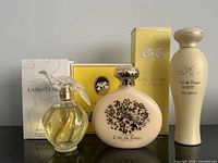 Group shot of all three bottles with their boxes