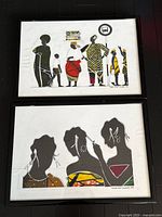 Both framed artworks together