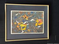 Full view of framed Pat McNaughton mixed media print